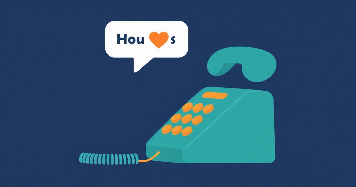 Person on a phone call at a kitchen table