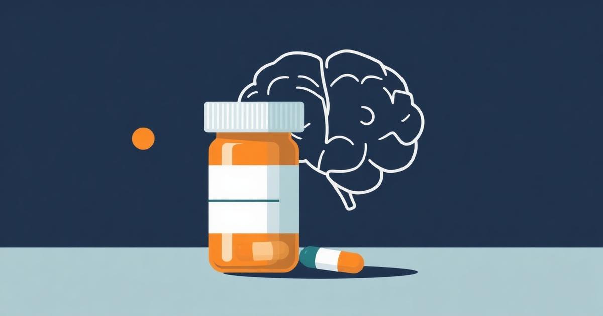Prescription medication capsules on a neutral background